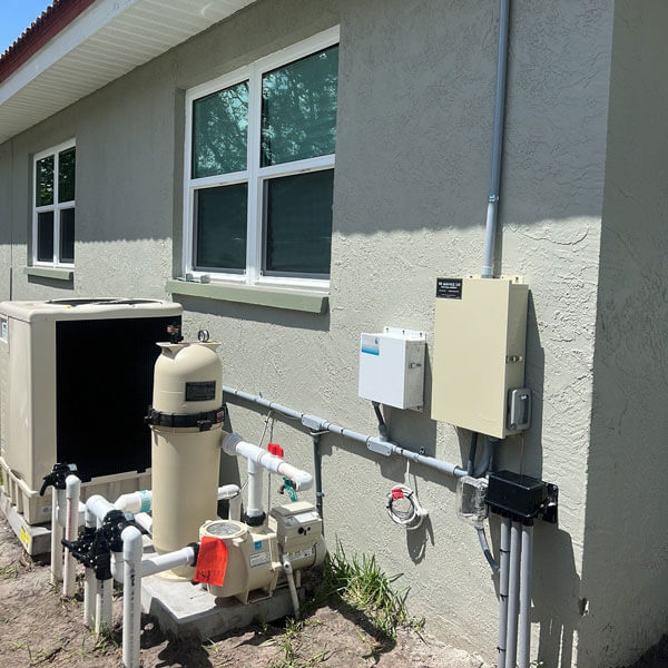 panels and pipes behind home