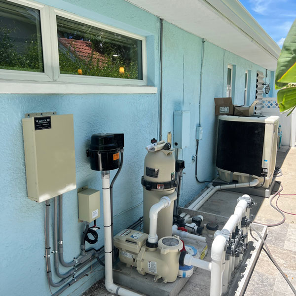 panels and pipes behind home