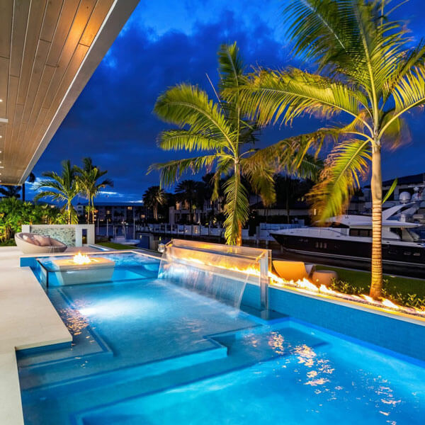 luxurious pool with lighting at night