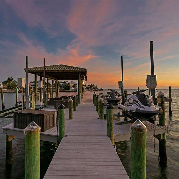 boat dock at sunset